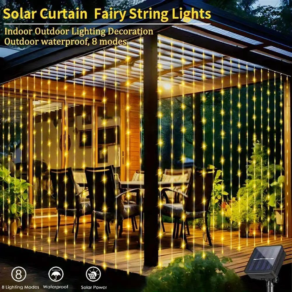 Outdoor patio with yellow fairy string lights hanging from roof, perfect for outdoor dining and gatherings